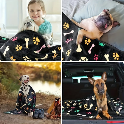 Stain-resistant fleece pet blanket with bone pattern, machine washable for dogs and cats, suitable for small to large breeds.