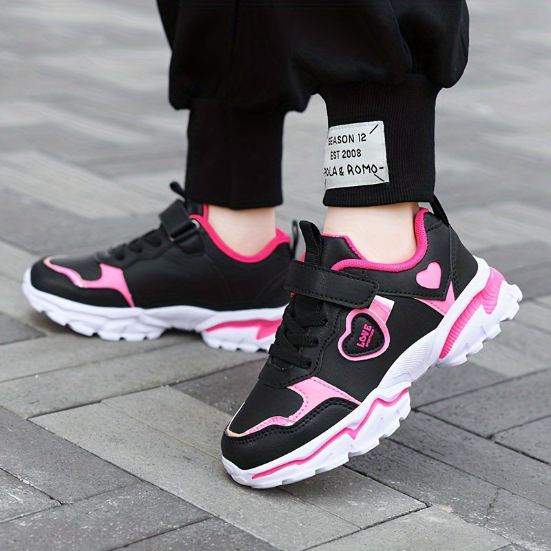 Stylish black and pink running shoes with glow-in-the-dark feature and hook-and-loop fastener, perfect for all seasons.