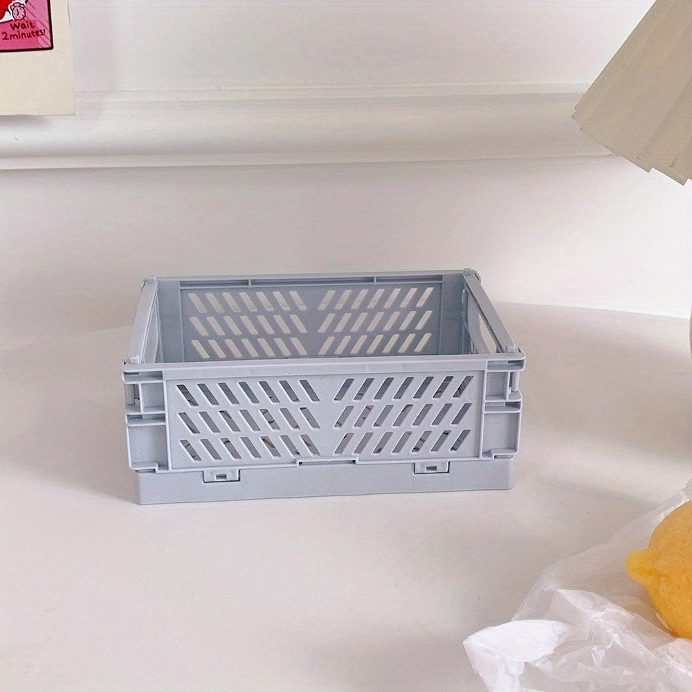 Mini Folding Plastic Storage Box for desktop or home office organization.