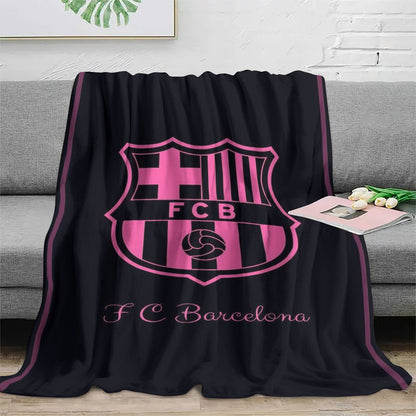 Stay warm and cozy with this F.C. Barcelona fan gift blanket. Perfect for all-season comfort, office naps, and air conditioning wraps. Made from durable and machine washable polyester with a contemporary style, this blanket is 100% perfect for indoor and