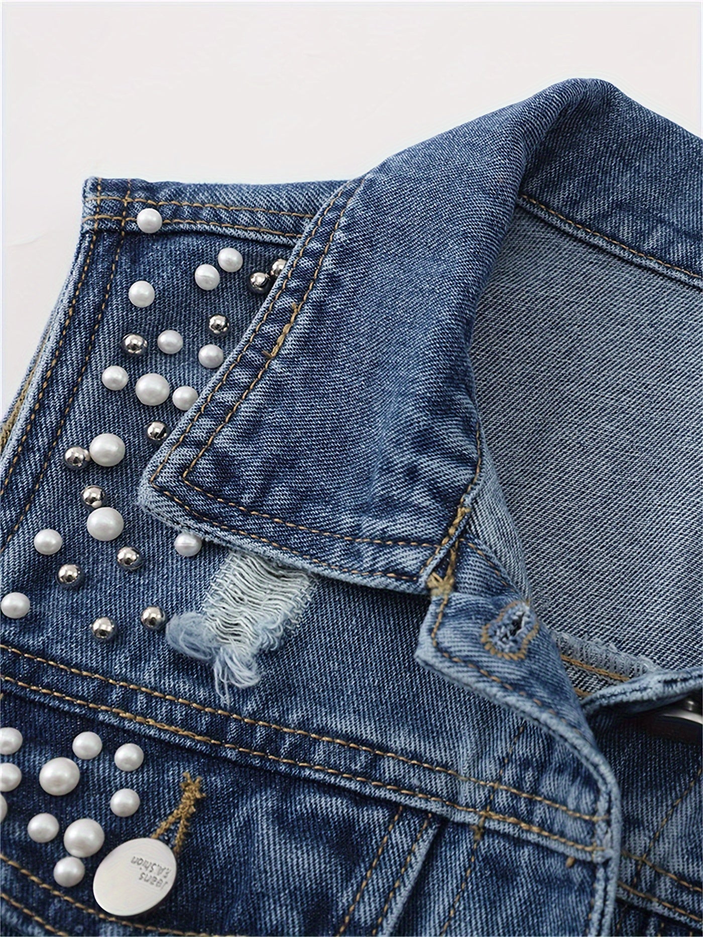 YANLINHUOLI Plus-Size Pearl-Beaded Denim Vest - Casual Light Blue Ripped Jean Jacket with Sleeveless Design, Button Closure, and Lapel Collar. Crafted for Spring/Fall Fashion.