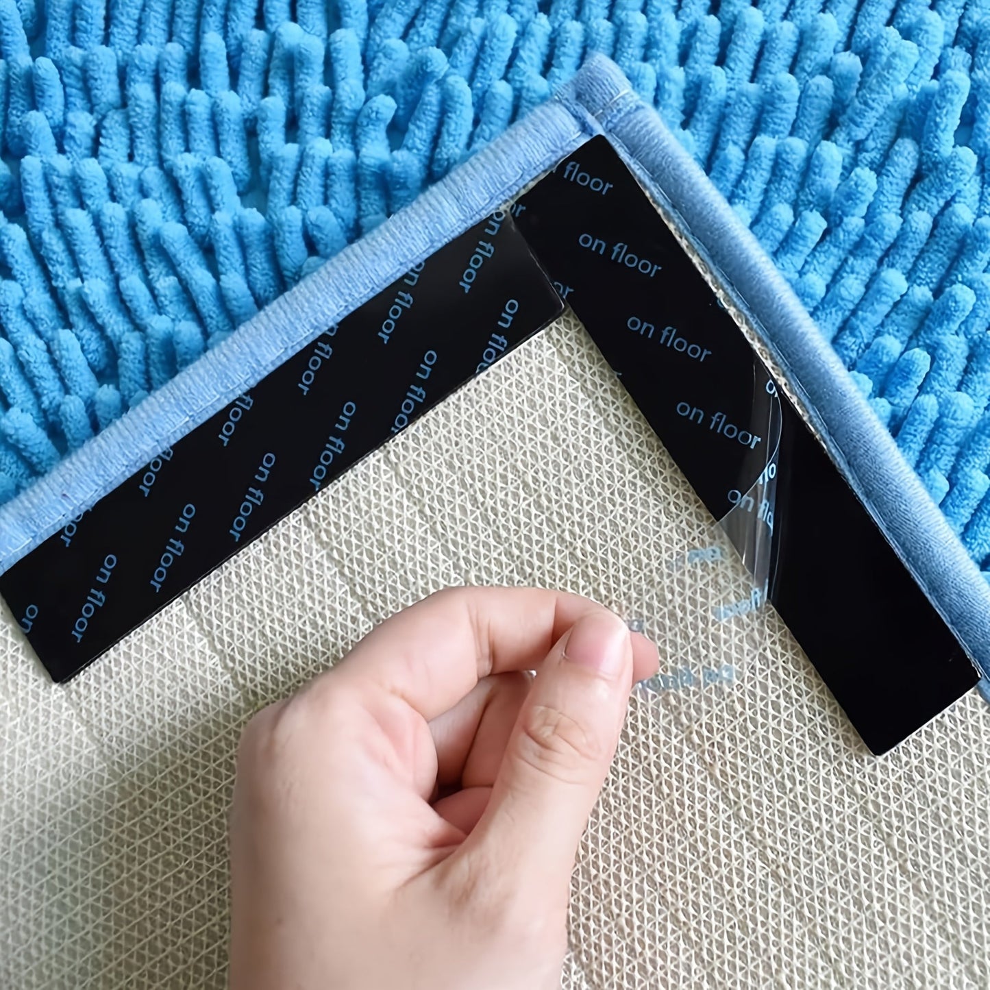 Get a set of four Silicone Rug Grippers - Double-Sided and Reusable Rug Tape Stickers for Non-Slip Grip on Hardwood Floors. These Waterproof Carpet Edge Grip Tape is perfect for use in offices and bedrooms.