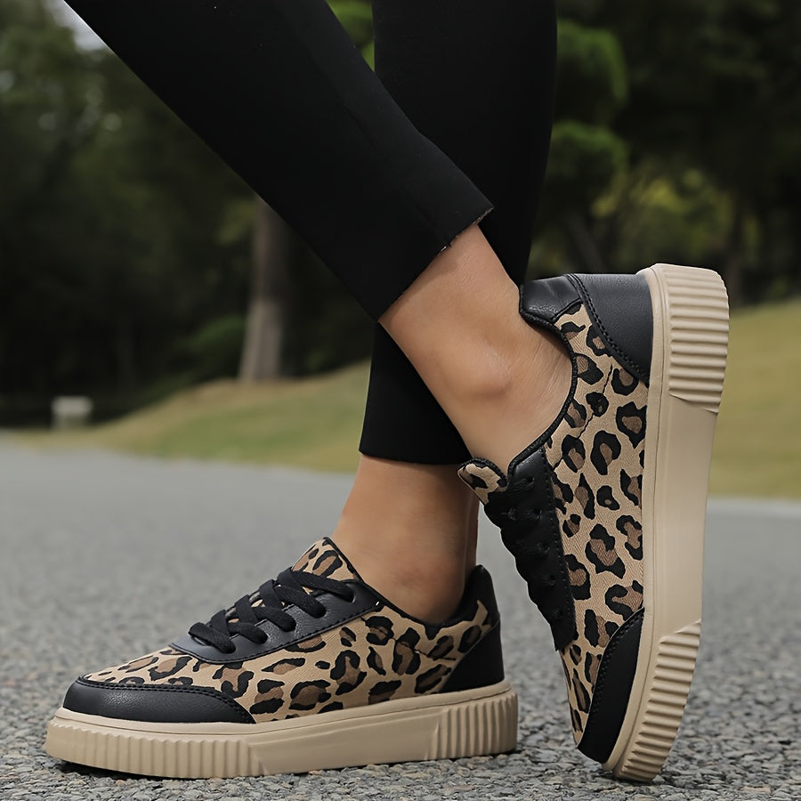 Comfortable flat casual shoes with leopard print for women, suitable for outdoor activities all year round. Made with fabric lining and insole, MD sole, lace-up closure, and regular toe