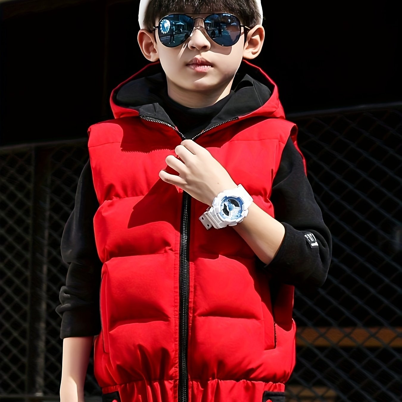 Boys' warm zip-up hooded vest with pockets, cozy color block top for fall and winter.