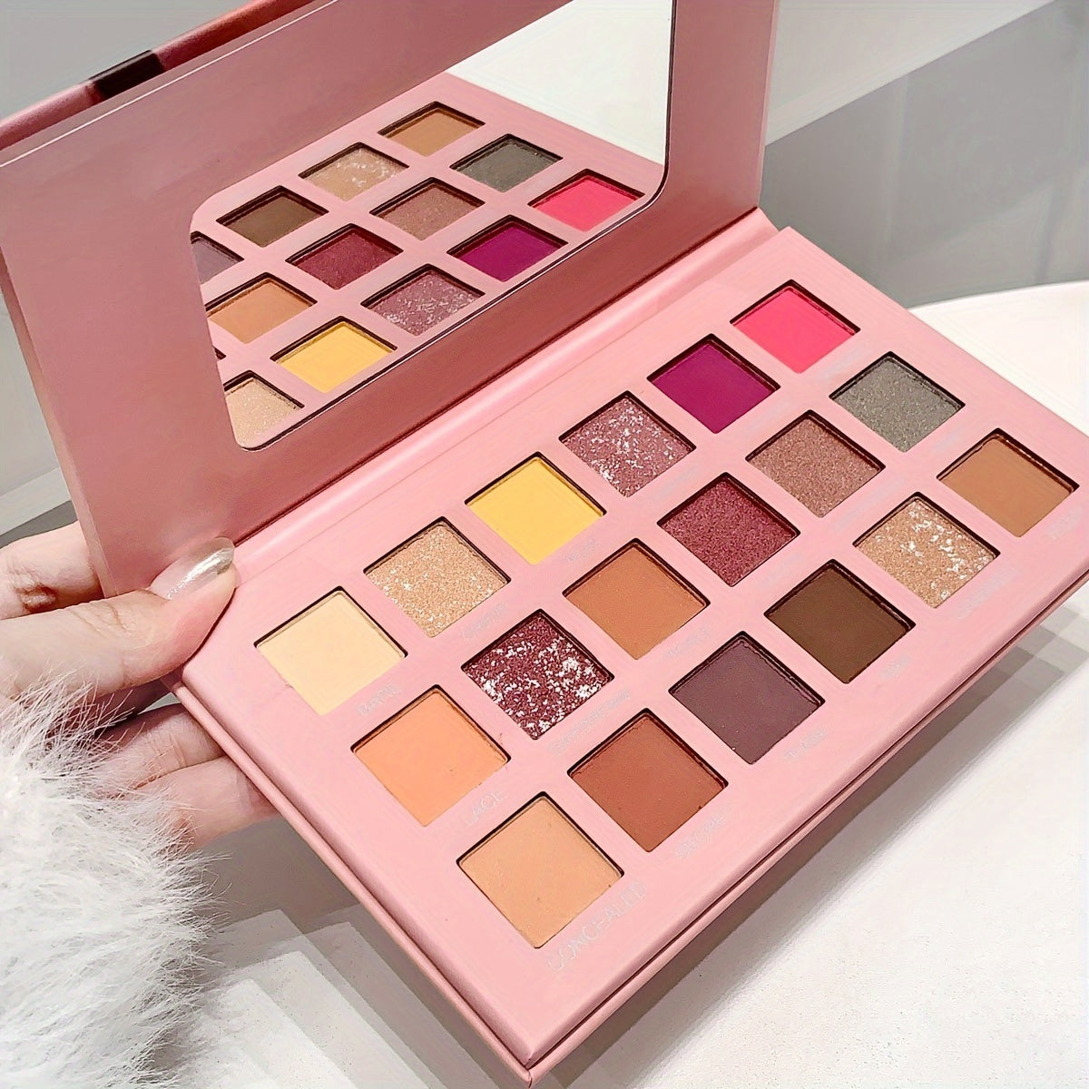 18-Color Desert Rose Eyeshadow Palette with various finishes for festivals, parties, and music events.