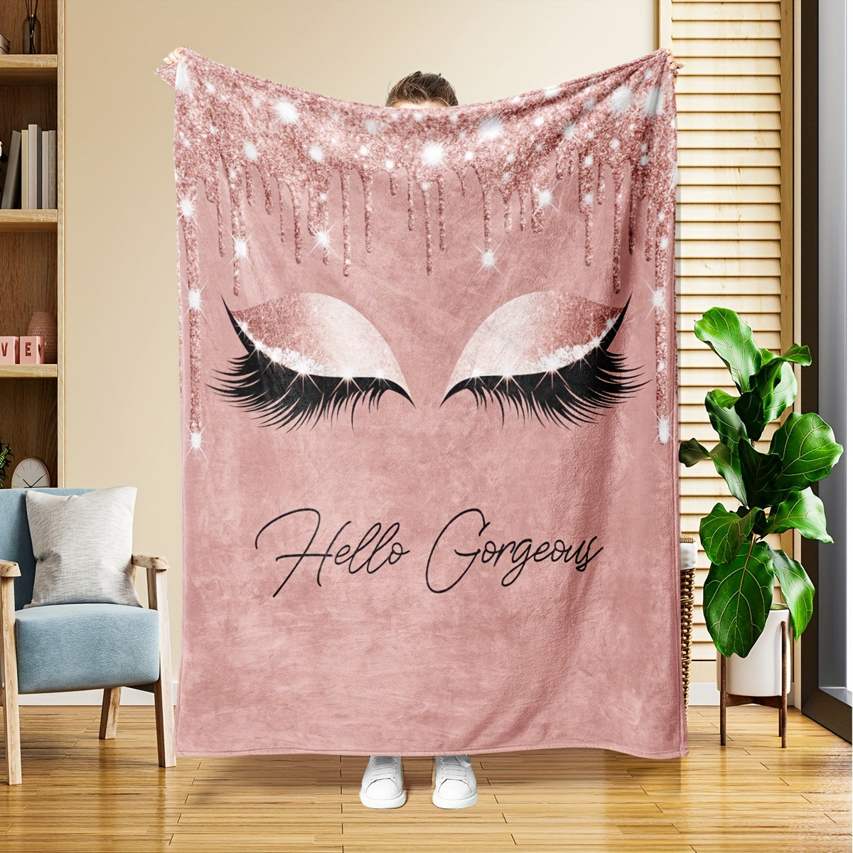 One piece of Sweet Makeup Art Eyelash Pattern Flannel Blanket, perfect for napping or throwing over a sofa or bed for extra warmth and coziness.