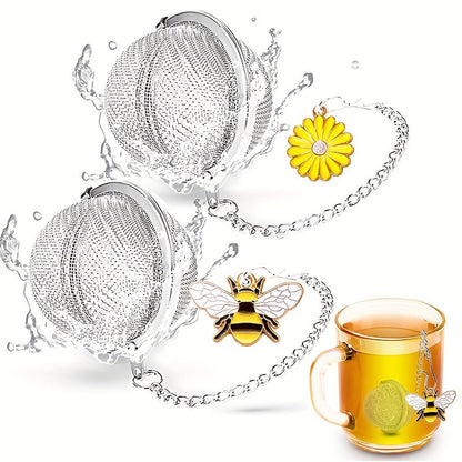 Gift your loved ones with a set of two stainless steel tea strainers adorned with charming honeybee and beehive designs. These durable infusers come with hanging chains and are perfect for brewing loose leaf tea. Ideal for Christmas, Thanksgiving