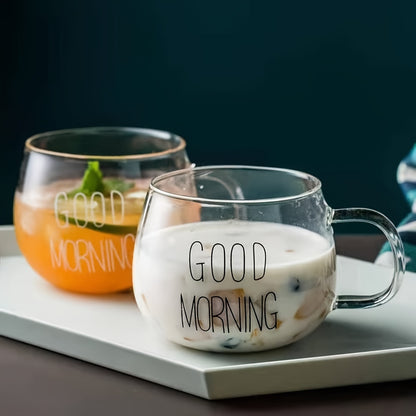 2 Nordic-inspired glass cups for coffee and cereal, ideal for breakfast beverages like milk, yogurt, and tea. Stylish transparent design for home or office use.