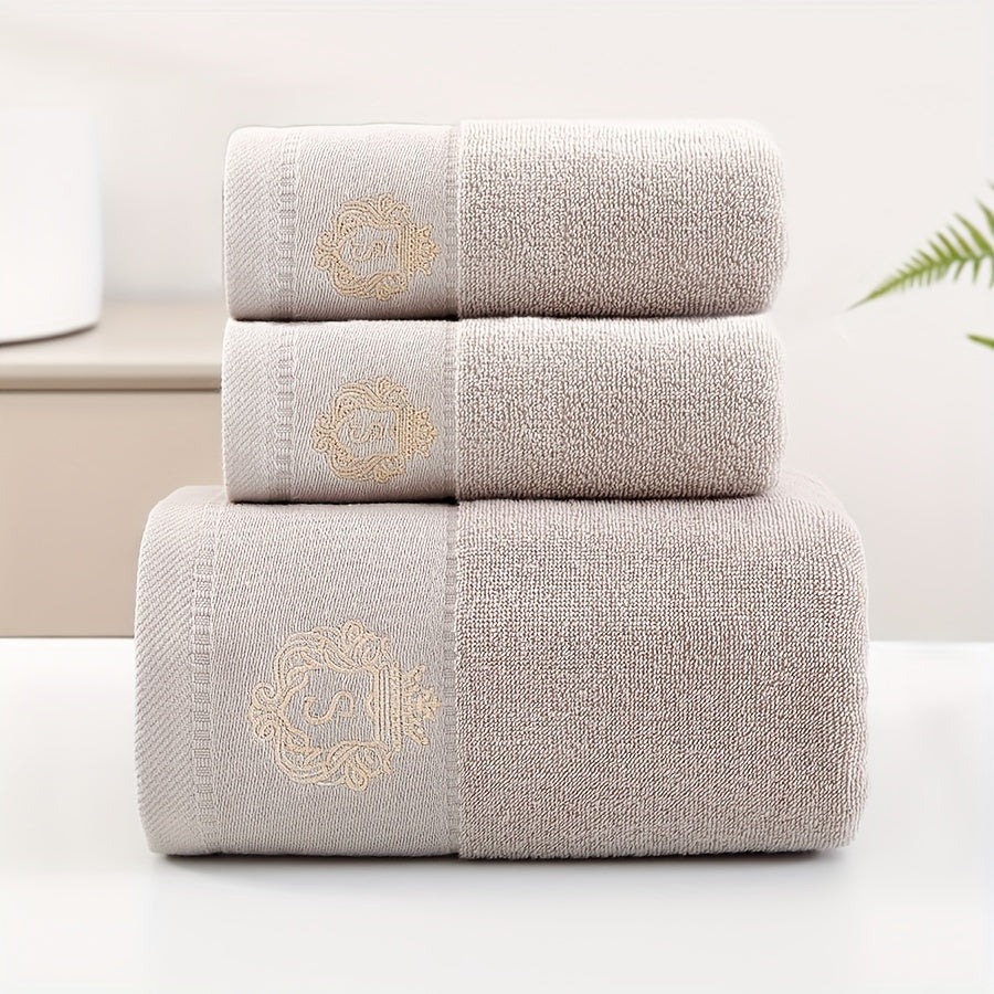 Modern, soft cotton towel set with embroidered character design and luxury crown motif. Highly absorbent, 450 GSM knit fabric. Perfect bathroom gift collection.