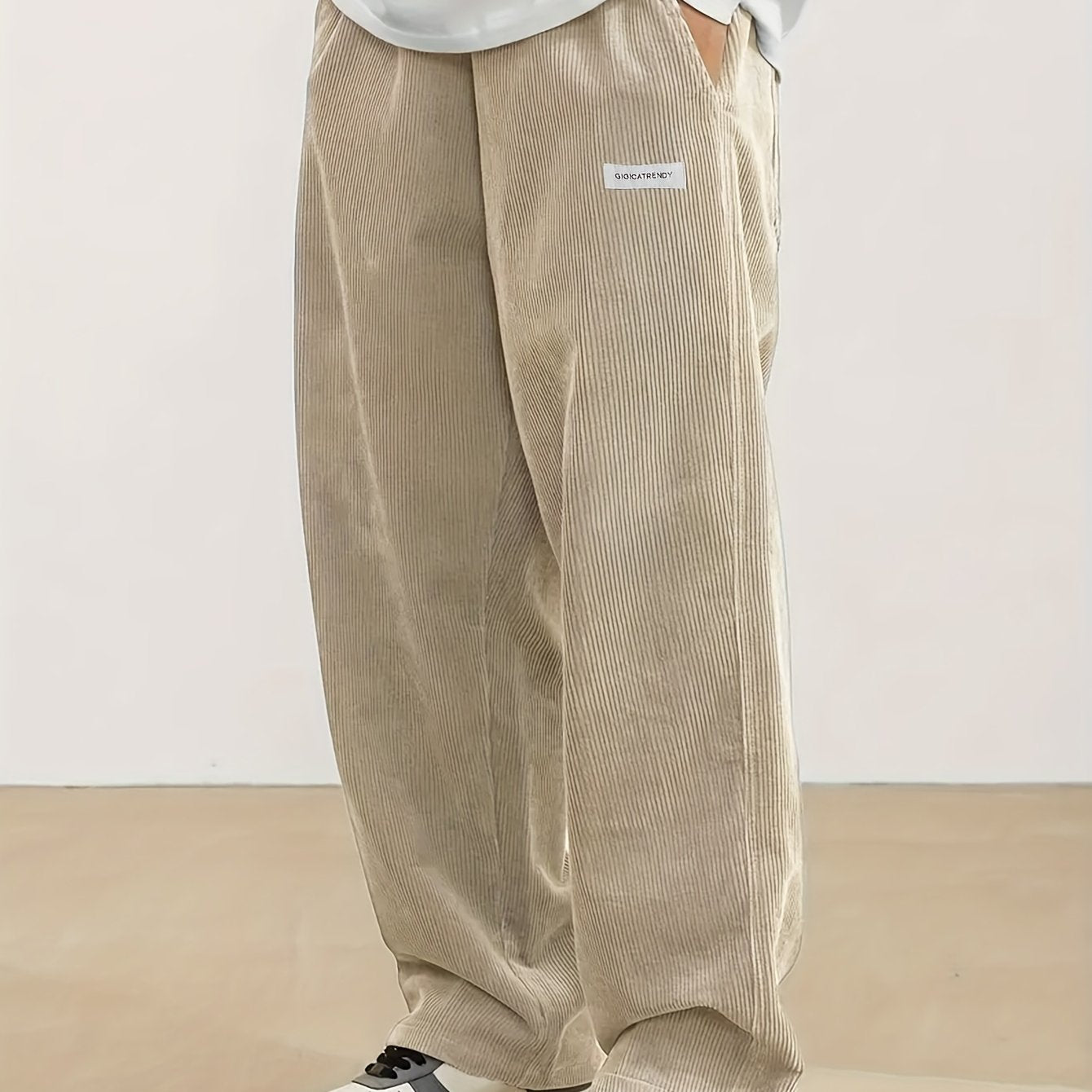 Men's casual corduroy pants with drawstring waist, ideal for outdoor activities and commuting.