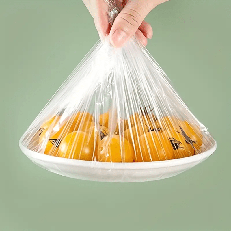 FreshSeal Food Storage Covers: 100 Disposable Plastic Rectangular Bags with Snap Closure, Kitchen-safe Elastic for Freshness.