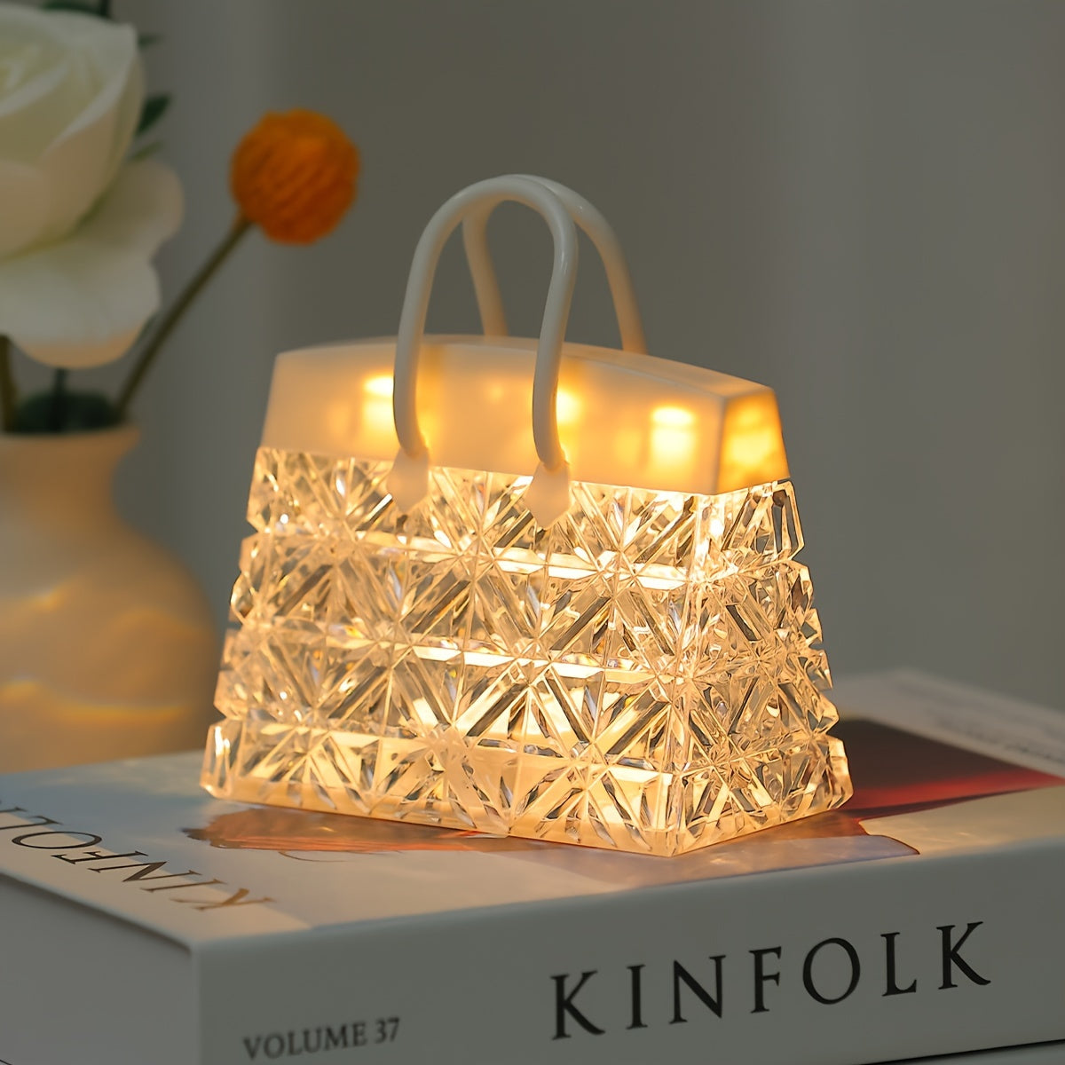 Chic Bag LED Night Light featuring a romantic petal design, ideal for bedroom ambiance and home decor. Battery-powered table light with 3D visual effect, great as a housewarming gift. By GMNEE.