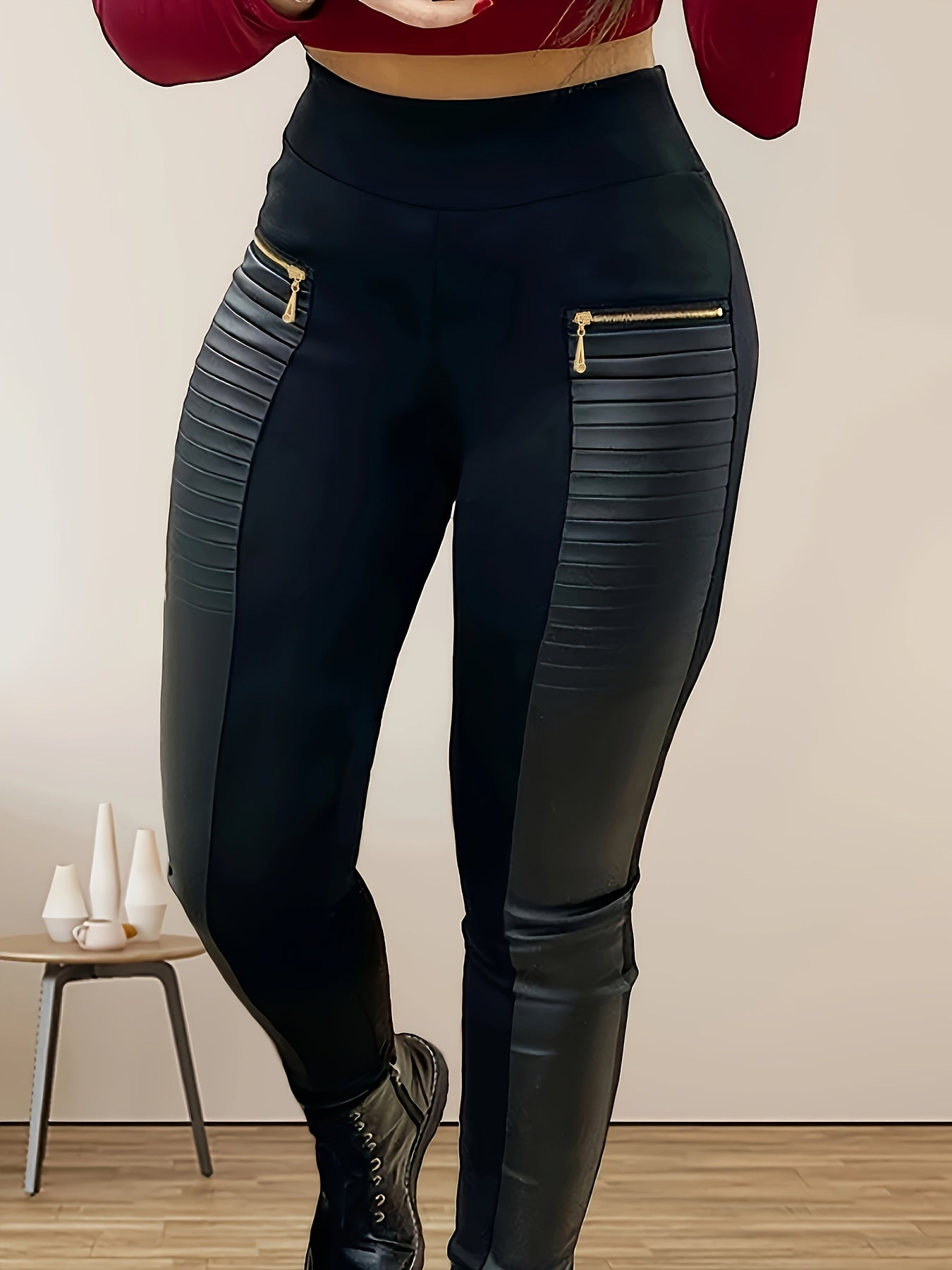 Plus size black tapered pants with golden zipper detail, high waist, stretchy polyester, casual solid color, machine washable, all-season comfort, flexible fashion, and sleek fabric.