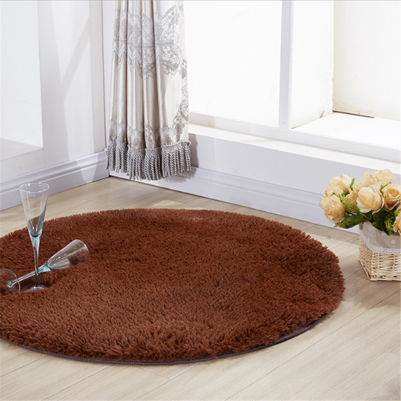 Soft, machine washable plush round area rug perfect for bedroom and living room decor - cozy and fluffy for maximum comfort.