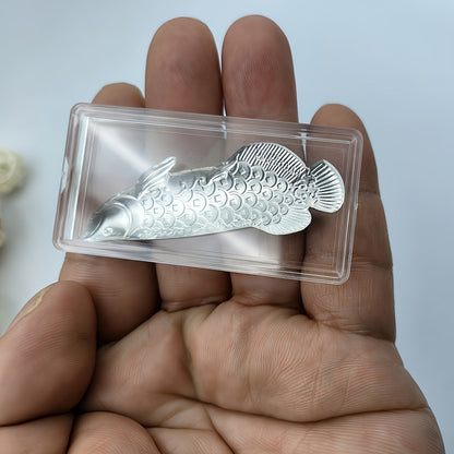 1 piece of silvery tea ceremony accessories for making tea and boiling water, a silvery dragon fish tea pet, and a silvery leaf for sterilizing and softening water quality.