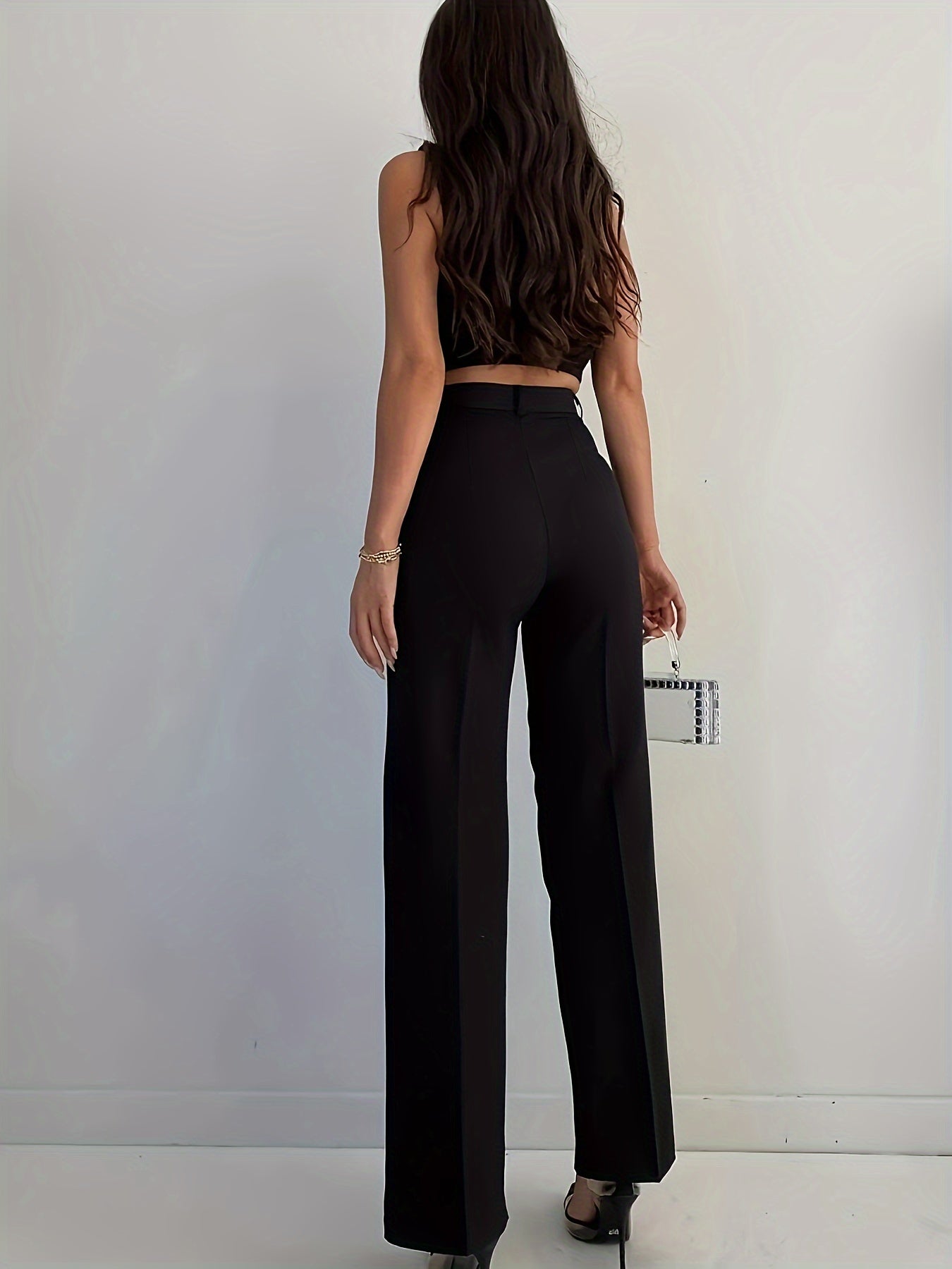 Elegant high waist straight leg pants with pintuck detailing for women.