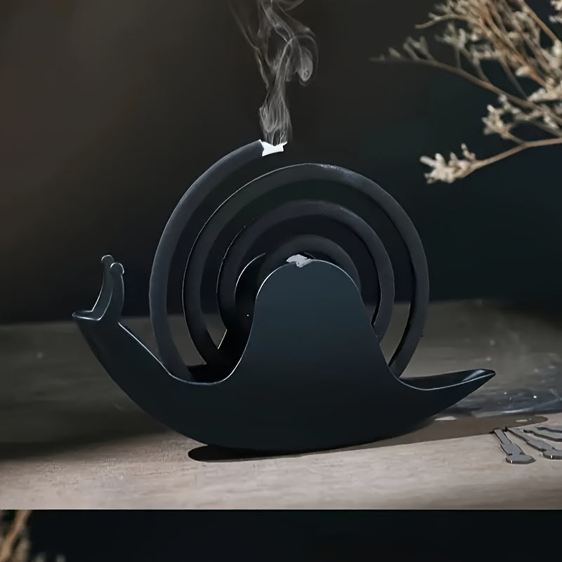 Unique whimsical snail-shaped incense holder made of fireproof and heat-resistant iron, perfect for home decor and spring celebrations. Easy to clean design ideal for St. Patrick's Day and Easter.