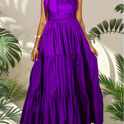 Stylish summer maxi dress for women with bow tie straps, cinched waist, solid color, and machine washable.