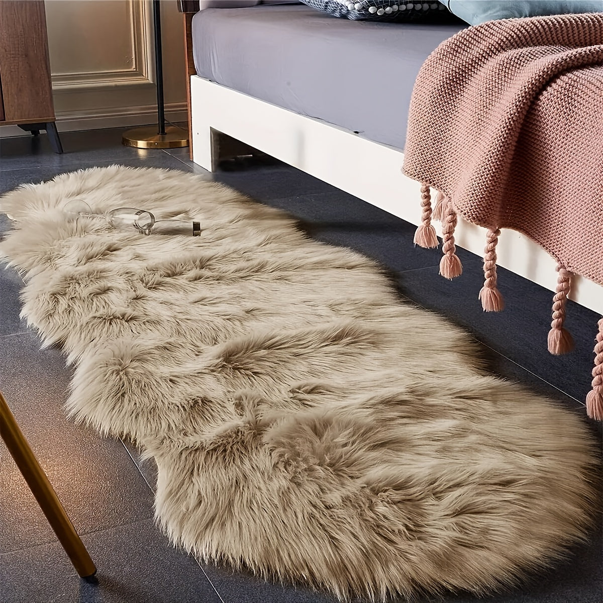 Simple and casual, this plush floor mat made of imitation wool is perfect for any room in your home. It is soft, non-slip, and waterproof, making it ideal for use in the living room, bedroom, restaurant, bathroom, or anywhere you need a touch of cozy