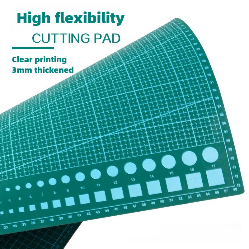 Durable A3 cutting mat for quilting and sewing, featuring a high-precision non-slip surface for fabric, paper, and crafting projects. Ideal for crafters and hobbyists.