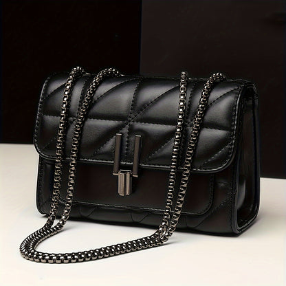 Stylish black quilted crossbody bag with adjustable strap, waterproof faux leather and embroidered detail. Perfect for women's fashion with a classic look and matching chain.