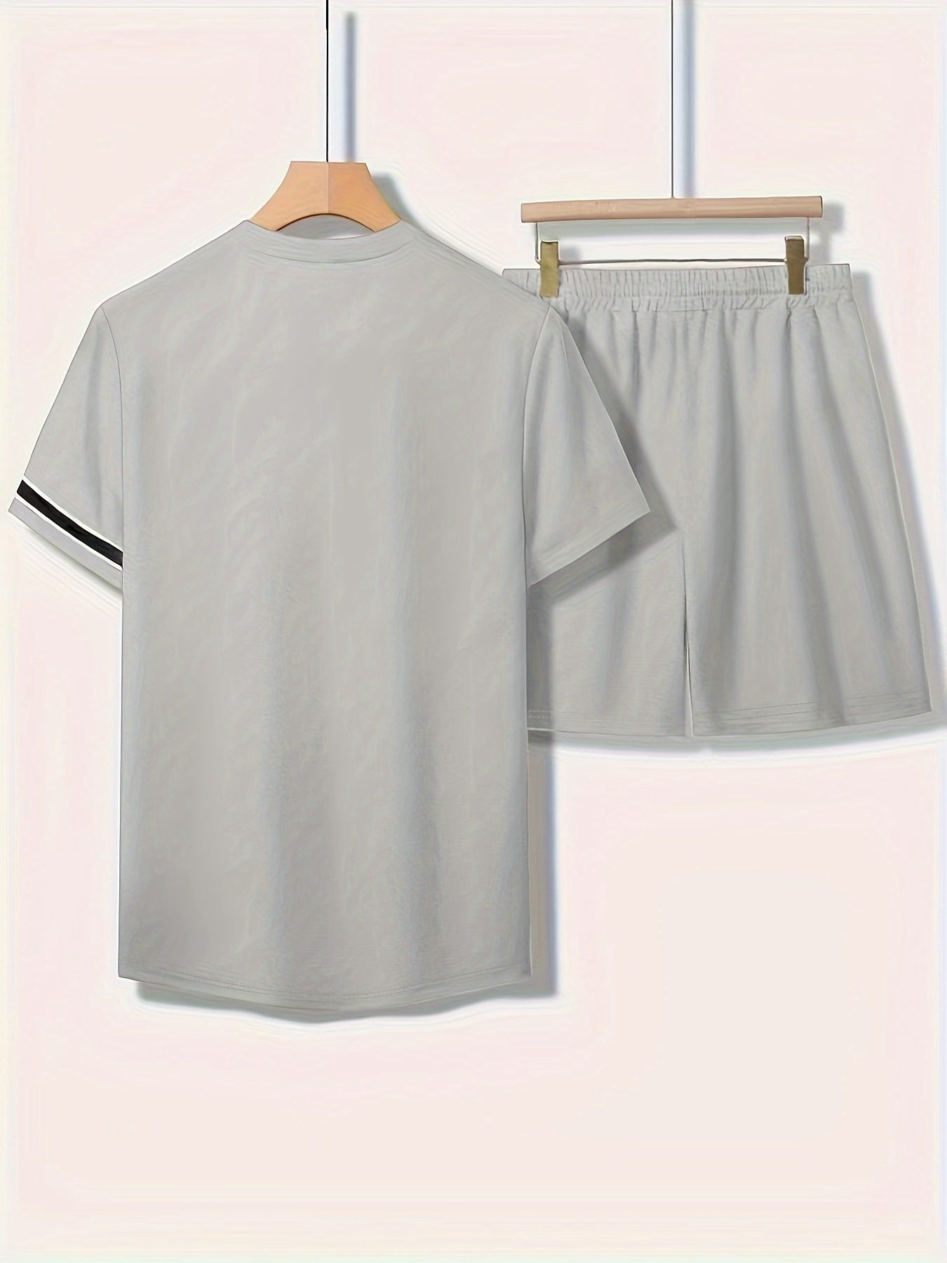 Men's plus-size casual outfit set with striped polyester T-shirt & shorts in light gray, featuring pockets, round neck, and elastic waistband.