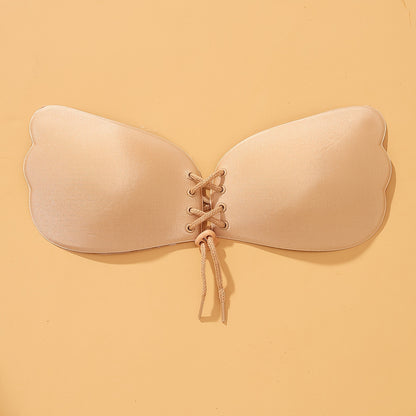 Set of 3 front lace-up stick-on bras, breathable and reusable, perfect for strapless wear. Feminine lingerie accessory.