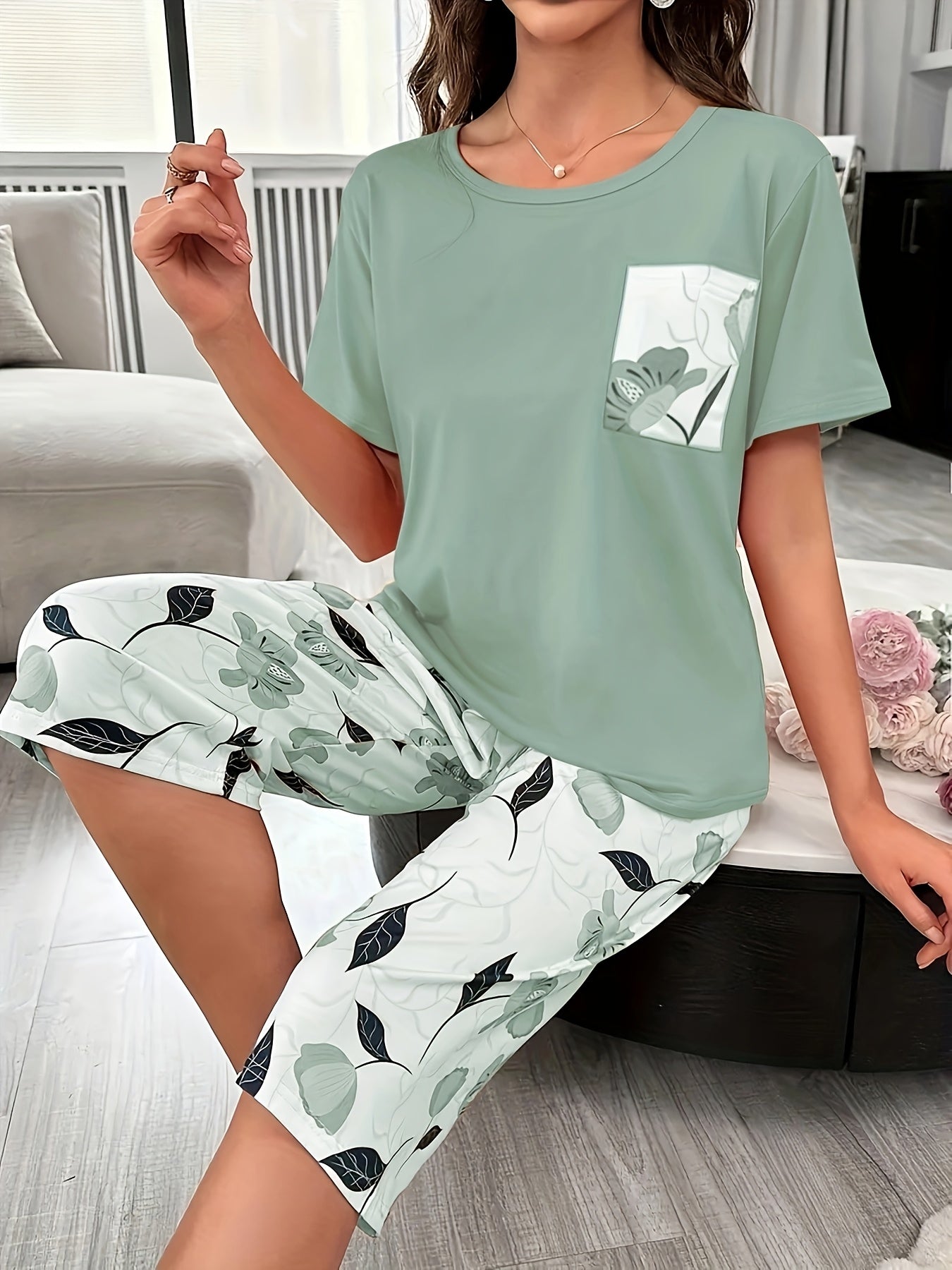 Trendy floral print three-quarter pants set for outdoor wear and loungewear for plus size women.