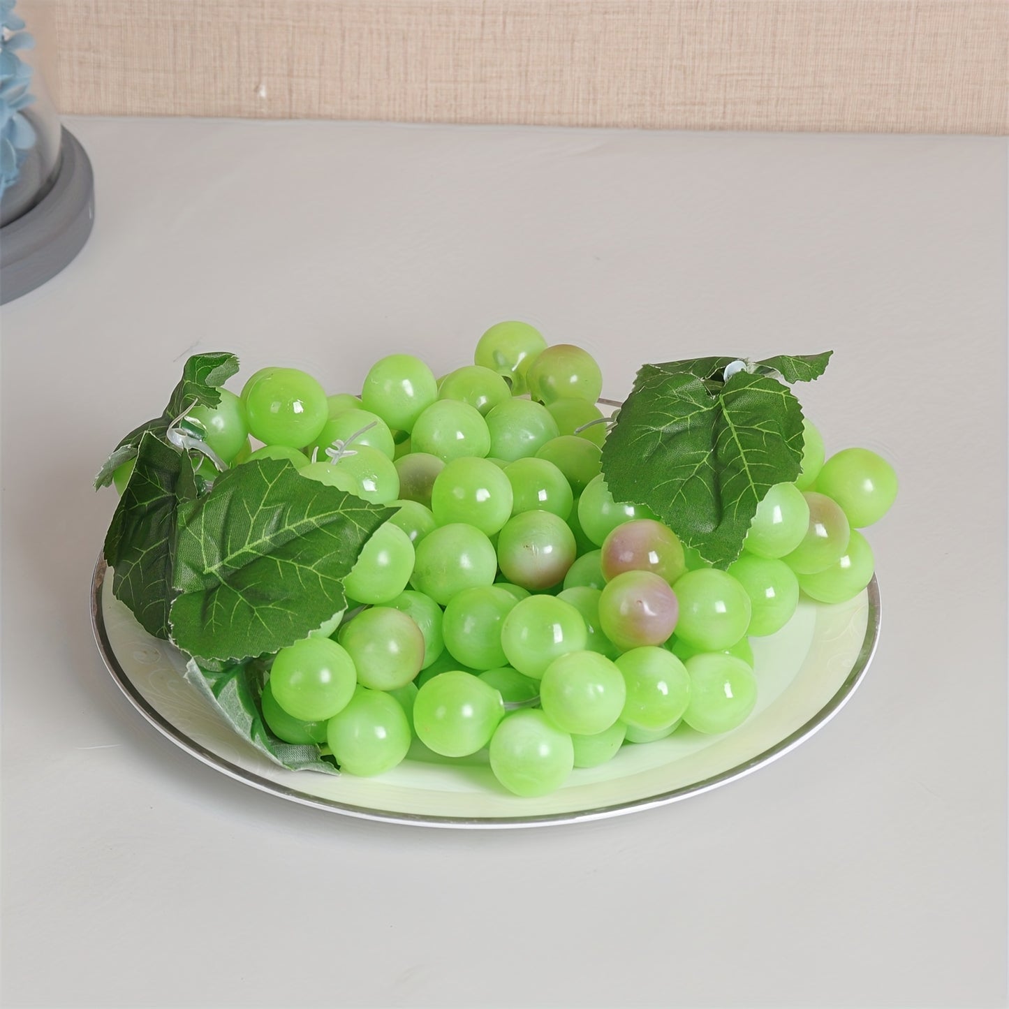 A string of artificial grapes with 36 large beads per string can be hung up for Halloween and Thanksgiving parties, as well as for weddings, kitchen displays, and Christmas gifts.