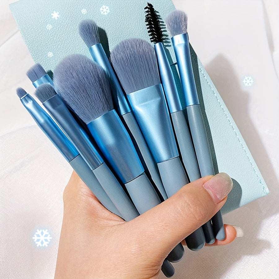 8 soft, portable facial makeup brushes in blue for entry-level beauty tools. Includes eyeshadow, nose shadow, blush, lip brush, eyelash comb, and travel powder brush. Ideal gift for beauty