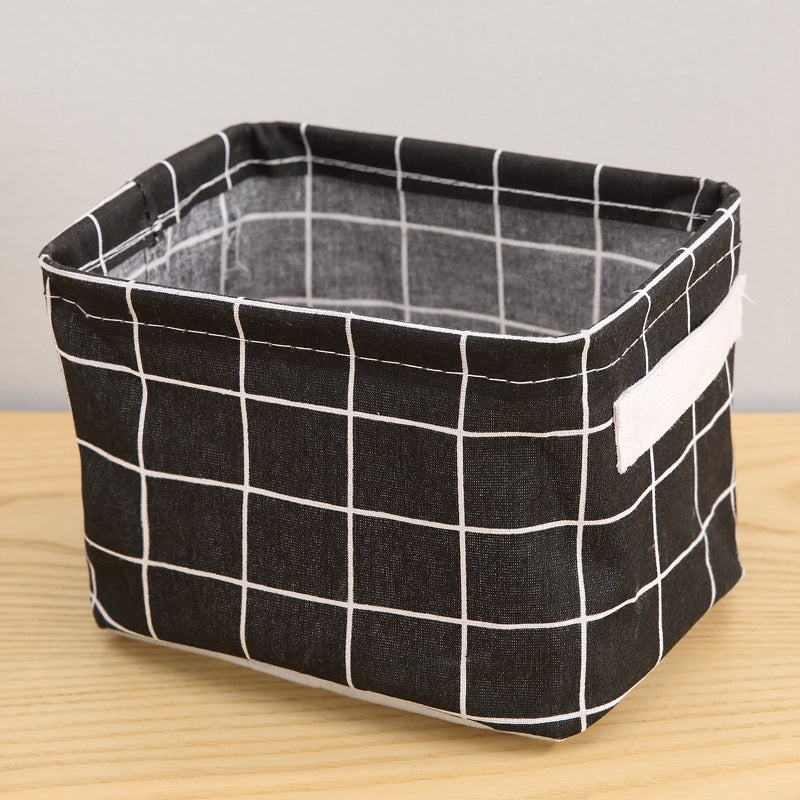 Waterproof desktop storage box made of printed cotton and linen with handle, suitable for organizing sundries.