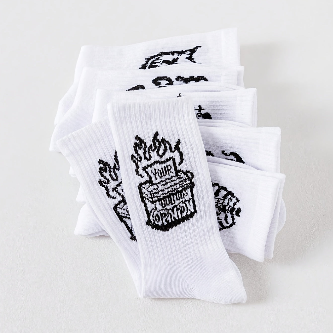 6/10 pairs of men's mid-calf socks with random black and white graffiti designs for all seasons.