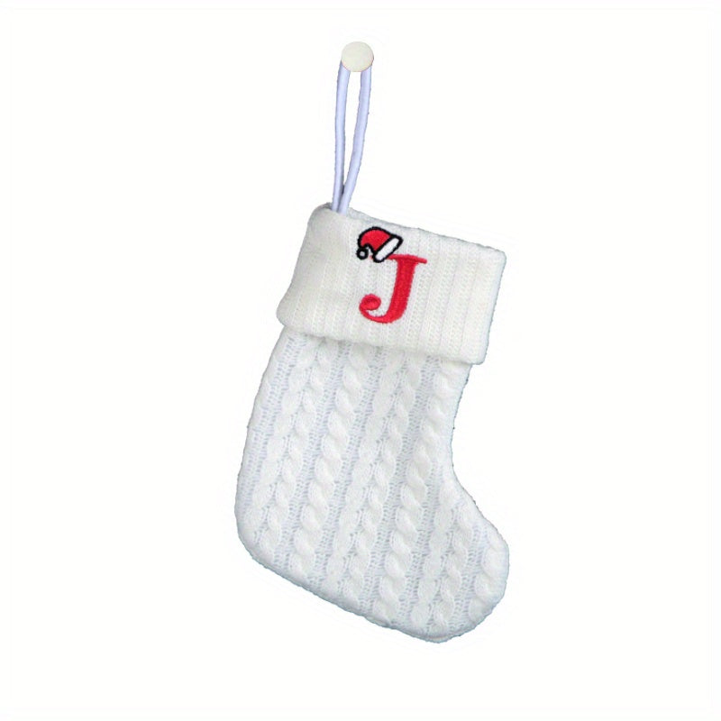 White cable knit stocking with embroidered 'F' - Ideal for indoor decor.