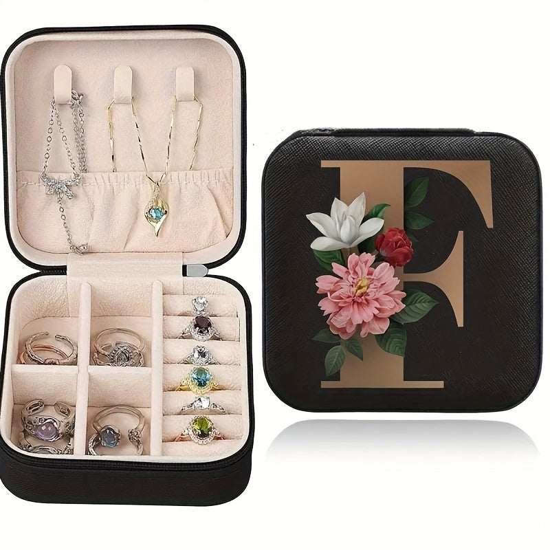 Floral initial jewelry organizer box with compact design, soft velvet lining, durable zipper, and lightweight, ideal for jewelry organization and travel.