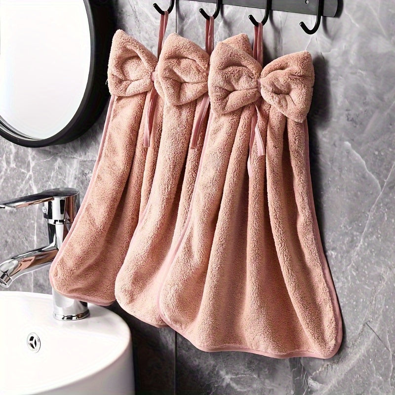 3-piece kitchen towel set with bowknot skirt pattern. Absorbent and quick-drying for household cleaning. Ideal kitchen essentials.