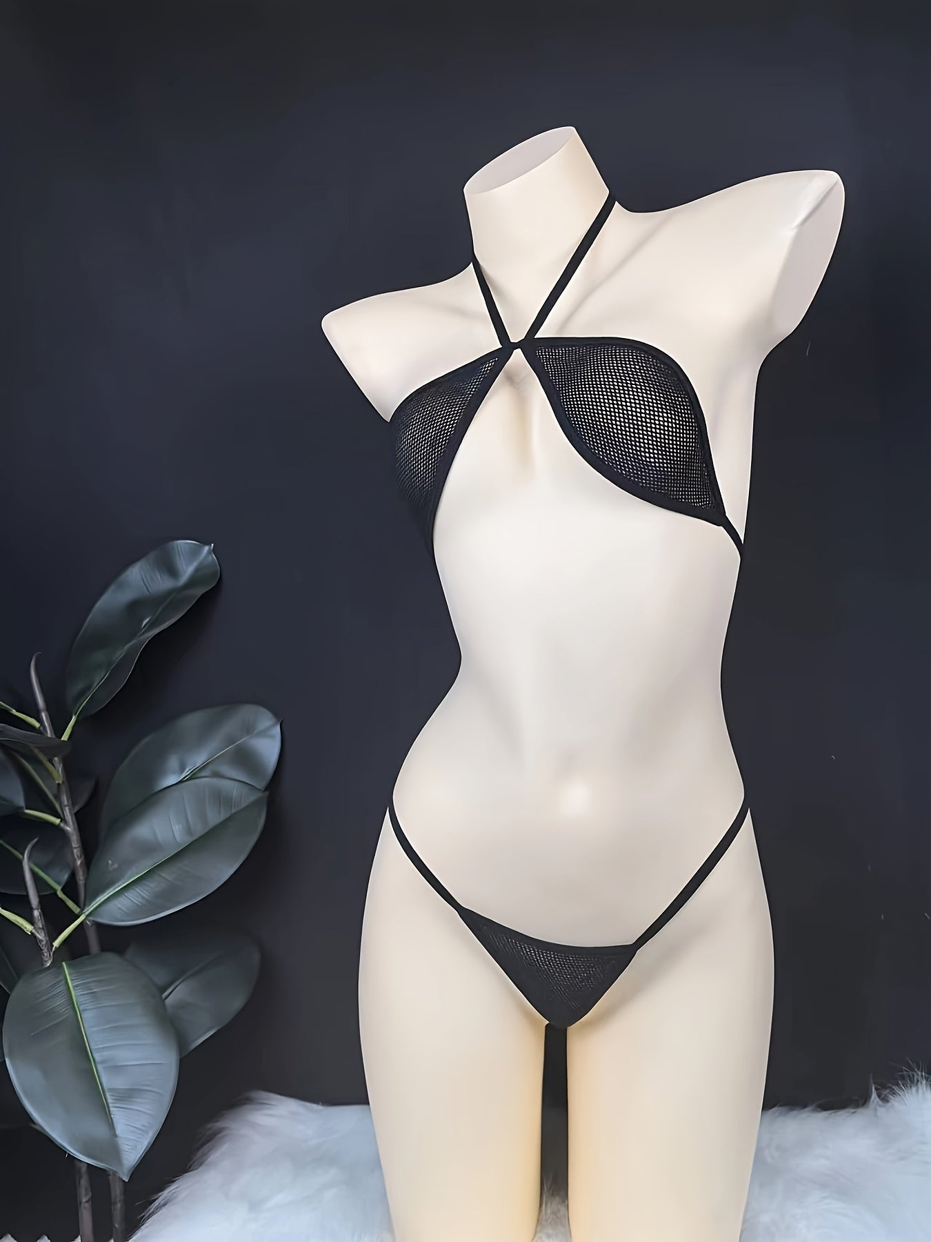 Stylish European and American streetwear featuring lace mesh and seductive net detailing in a bikini set.