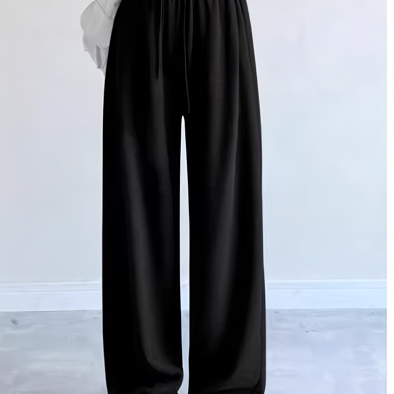 Introducing our new Youthful Wide-Leg Sweatpants for Spring/Summer 2024: made from a polyester blend, micro-elastic, solid color, long length, with pocket detail, loose fit, and suitable