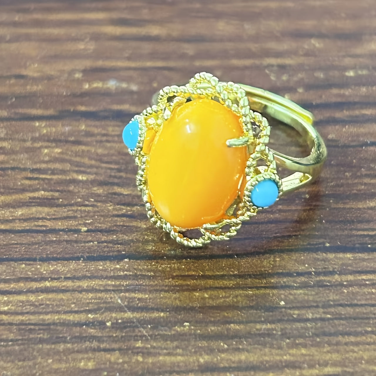 Vintage vacation style Claddagh ring featuring synthetic amber and turquoise stones, crafted with 18K golden plated 925 silver. The ring has an adjustable opening and is perfect for both daily wear and special occasions. This handcrafted personalized