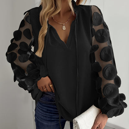 Women's round embellished mesh pullover top with notched collar, lantern sleeve, and contrast mesh details. Perfect for a night out or vacation. Made of solid color polyester with a regular