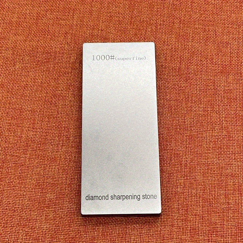 Professional metal whetstone system with diamond sharpening stones for knives. Includes grits of 1500#, 2000#, 2500#, and 3000#. Non-electric and suitable for kitchen cutlery. Perfect for chefs and outdoor use at home.