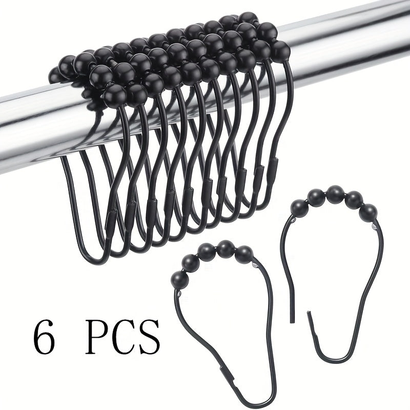 6 Cast Iron Shower Curtain Hooks with Rolling Bead Design. Smooth glide for towels and robes. Black finish, minimalist design, durable construction.