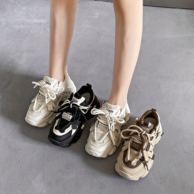 Colorblock lace-up sneakers with soft platform sole for walking comfort.