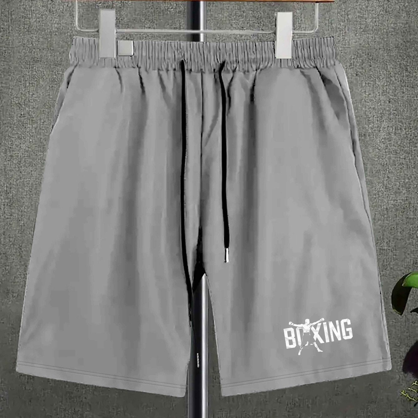 Big & Tall boxing fighter casual shorts in polyester fabric with pockets, non-stretch, woven regular fit, random print design in plus size.