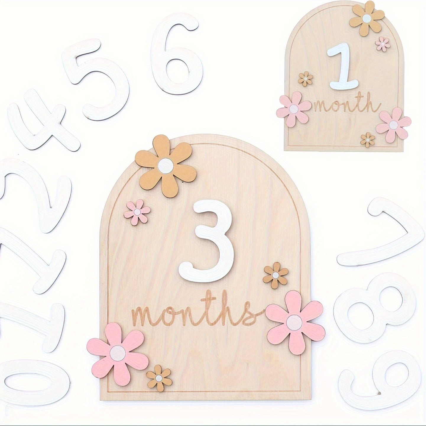 Wooden milestone cards set: track your baby's growth with monthly milestone discs featuring a floral AA design. Perfect for photo props and announcing your little one's first year. Includes discs for each month from 1 to 12.