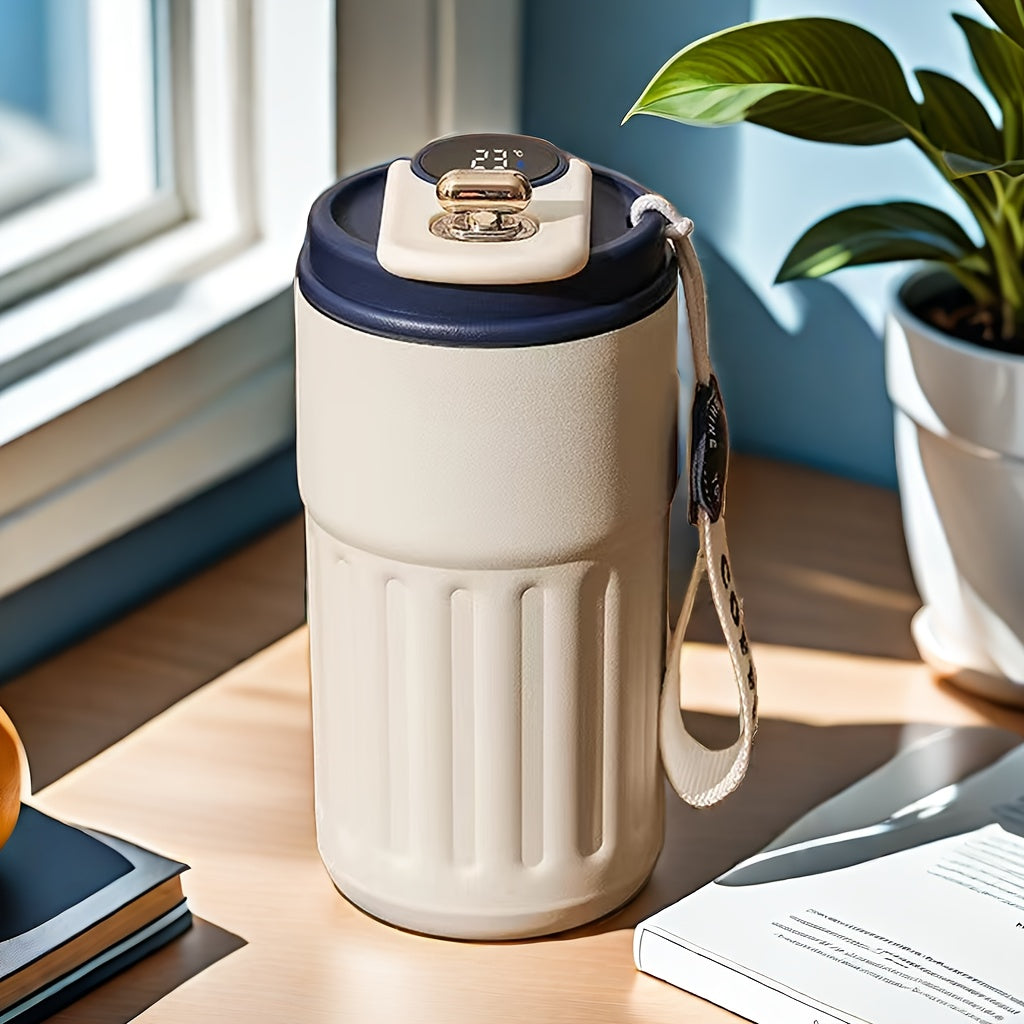 A 410ml stainless steel travel mug with temperature display, keeps beverages hot or cold, perfect for any occasion.