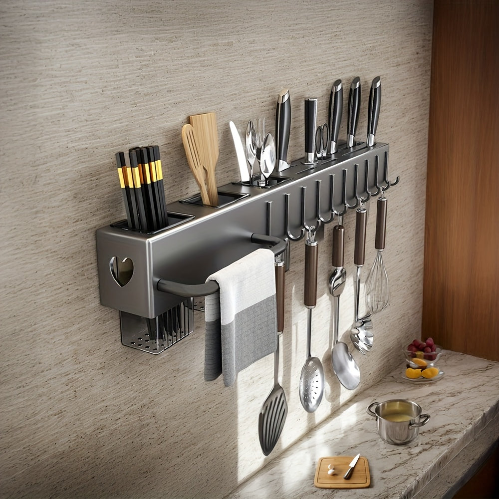 Wall-mounted kitchen utensil holder with hooks, no-drill installation for metal and plastic storage rack. Multi-functional organizer for cookware and cutlery, saving space in the kitchen with a convenient tool shelf and accessories.