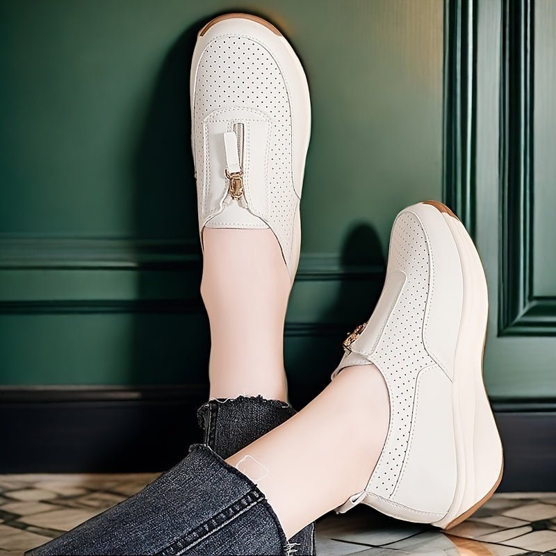 Beige perforated women's casual sneakers with zipper detail, thick sole, and anti-slip features.