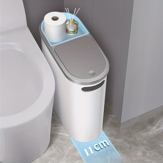 Durable plastic trash can with built-in handle for small spaces such as bathrooms, laundry rooms, and home offices.