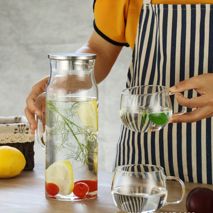 Large glass pitcher with lid and spout, perfect for hot/cold beverages like coffee, juice, and homemade drinks. Great holiday gift for friends, kitchen accessory.