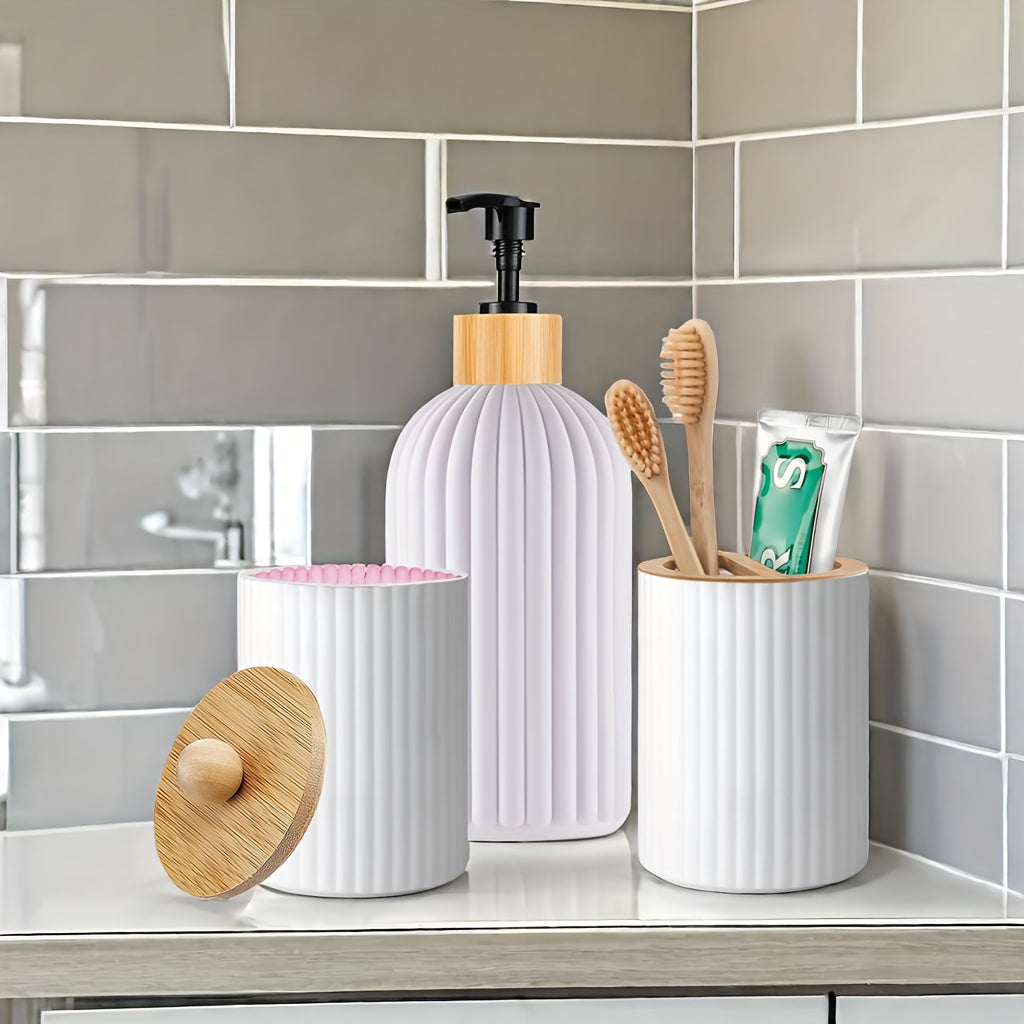 Set of 3 refillable bathroom dispensers made of lead-free plastic. Includes manual pump lotion dispenser, swab holder, and toothbrush organizer. Freestanding design requires no electricity.